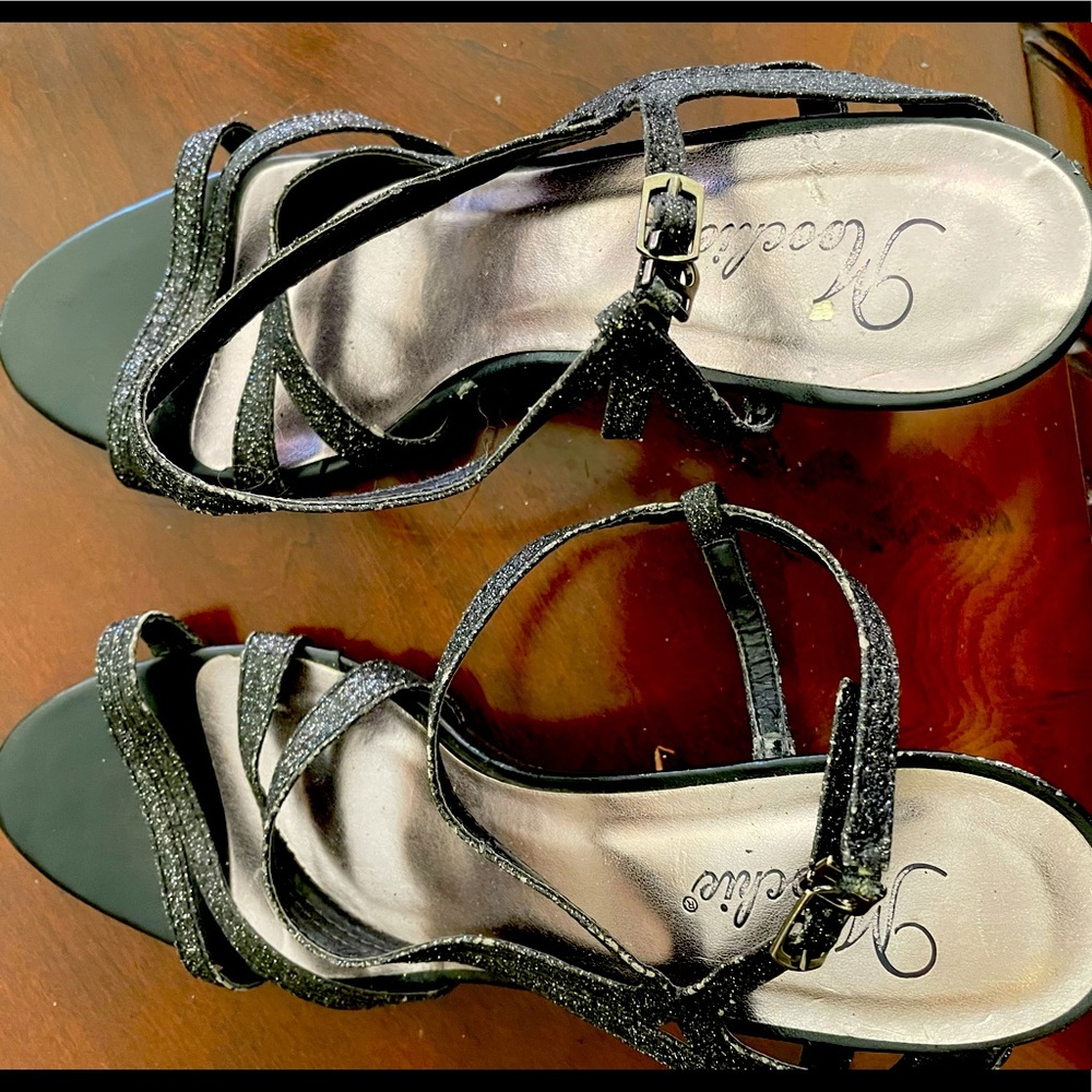 Black glitter scrappy sandals.